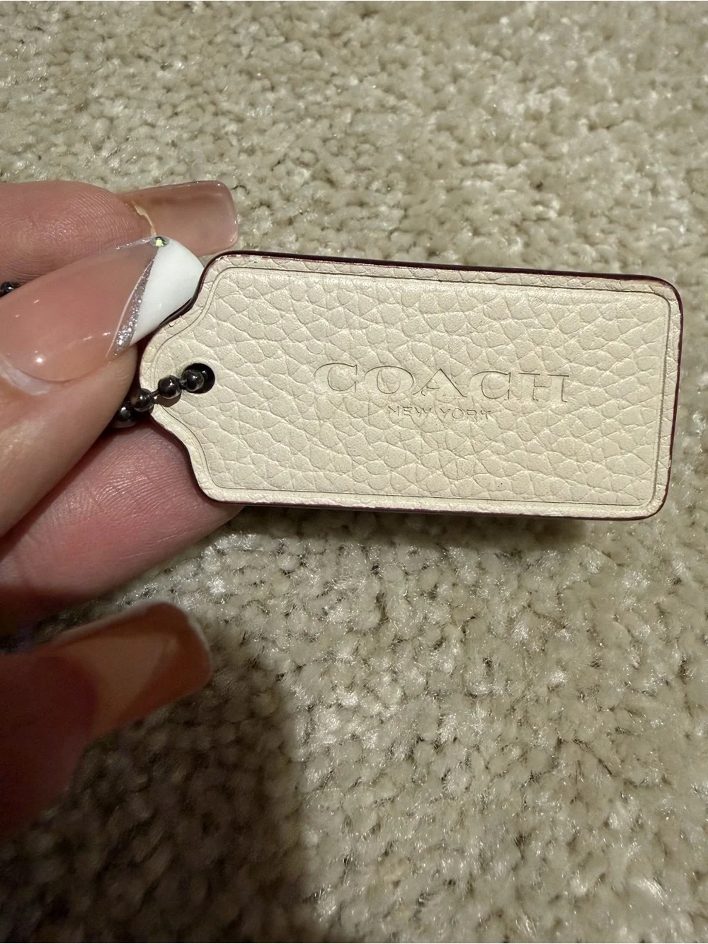 Coach Cream Leather Tag with Subtle Embossed Logo